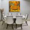 Cuadro decorativo con familia disfrutando una paella tradicional en mesa redonda.
