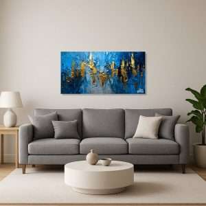 Cuadro decorativo abstracto con tonos azules y dorados intensos.